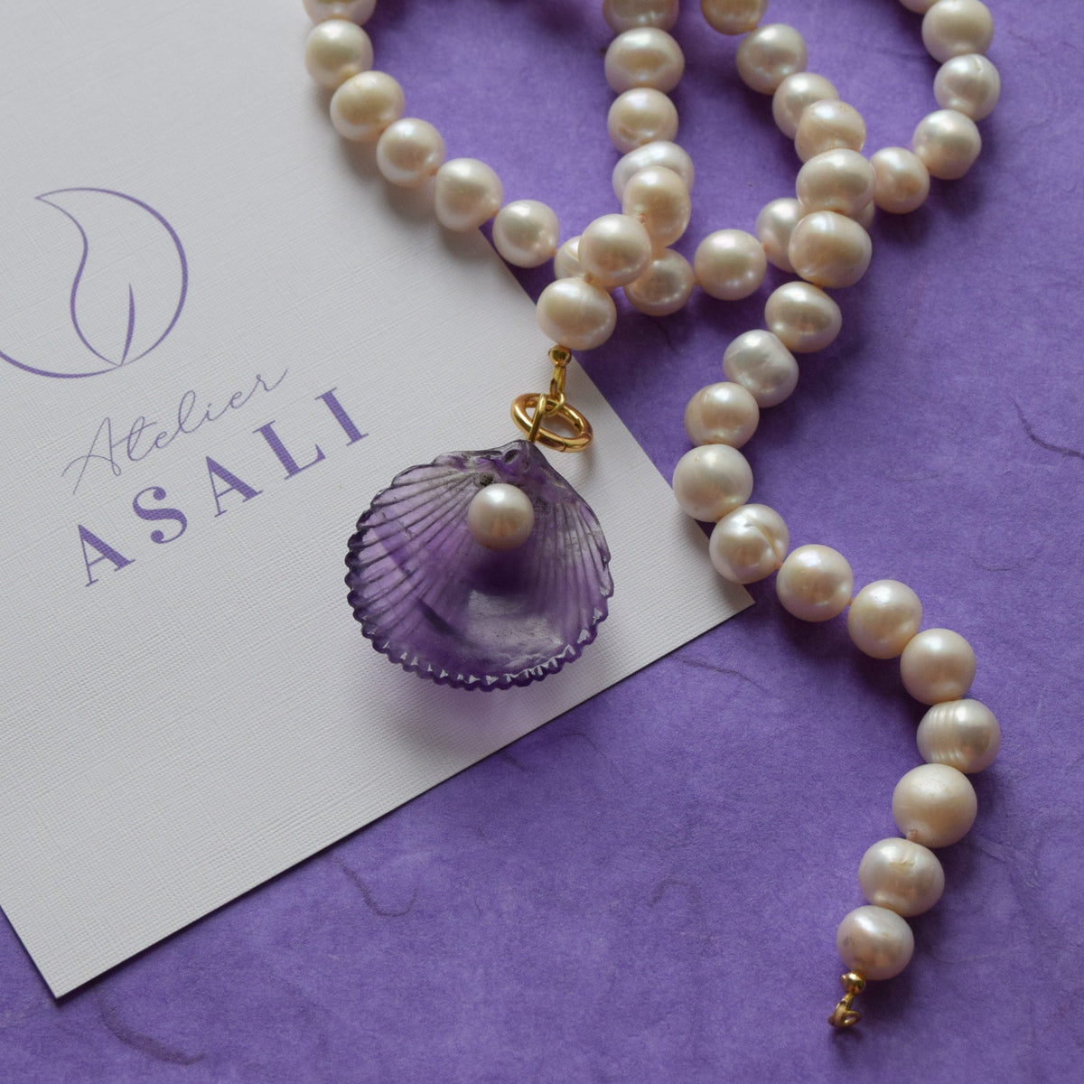 Shell & pearl pendant