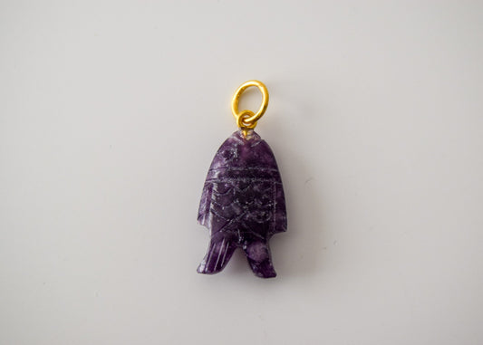 Intricately detailed, this versatile lepidolite fish charm features a delicate fish design carved from lepidolite gemstone, with the pendant ring made of gold plated material, it is perfect for various jewelry creations like a necklace or earrings, displayed on a neutral background